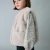 Gilet cape effet fourrure Gilet cape effet fourrure