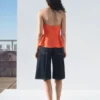 Gilet à dos nu et basque Gilet à dos nu et basque