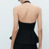 Gilet à dos nu et basque Gilet à dos nu et basque