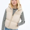 Gilet matelassé à capuche Gilet matelassé à capuche
