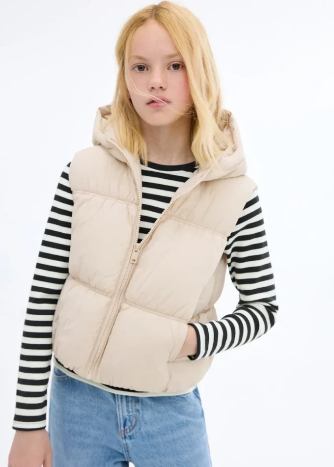 Gilet matelassé à capuche Gilet matelassé à capuche
