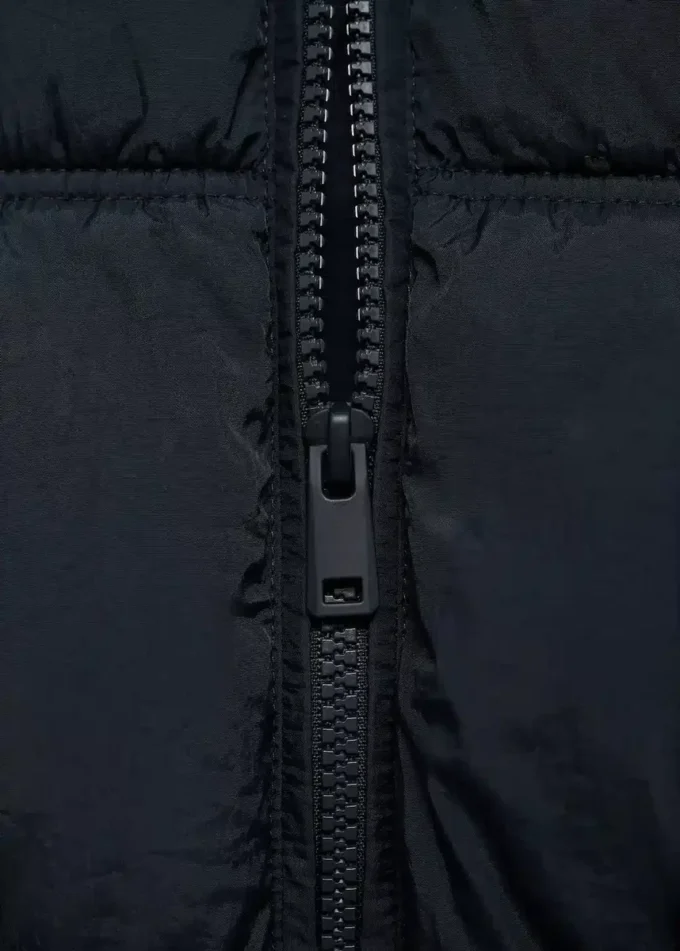 Gilet matelassé à capuche Gilet matelassé à capuche
