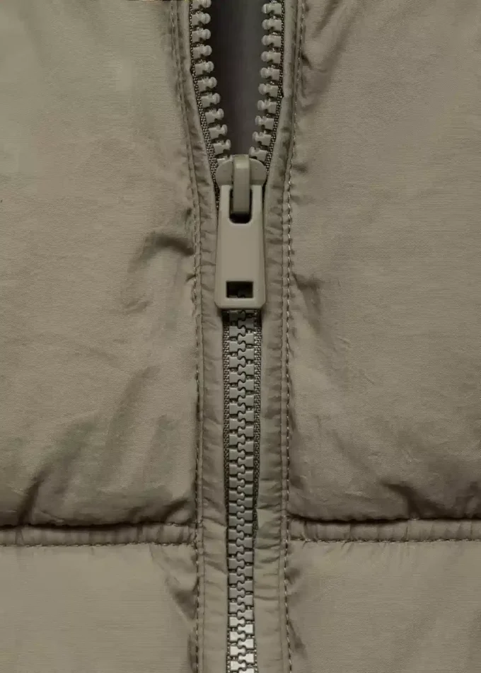 Gilet matelassé à capuche Gilet matelassé à capuche