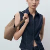 Haut en denim avec coutures contrastées