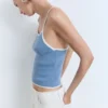 Haut en maille avec bordures contrastées