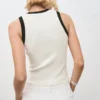Haut en maille avec passepoil contrasté
