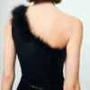 Haut en plumes à mailles fines Haut en plumes à mailles fines
