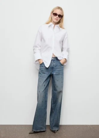 Jean à jambes droites avec œillets