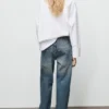 Jean à jambes droites avec œillets Jean à jambes droites avec œillets