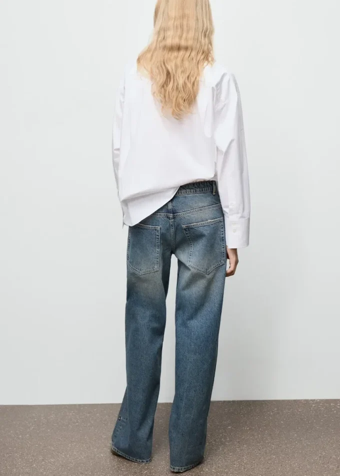 Jean à jambes droites avec œillets Jean à jambes droites avec œillets