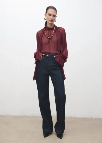 Jean à jambes droites avec patte de boutonnage