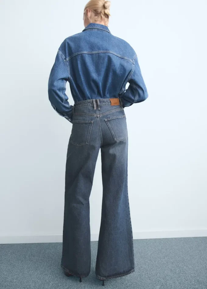 Jean à jambes larges avec boutons Jean à jambes larges avec boutons