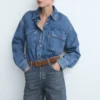Jean à jambes larges avec boutons Jean à jambes larges avec boutons