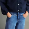 Jean à jambes larges avec clous Jean à jambes larges avec clous