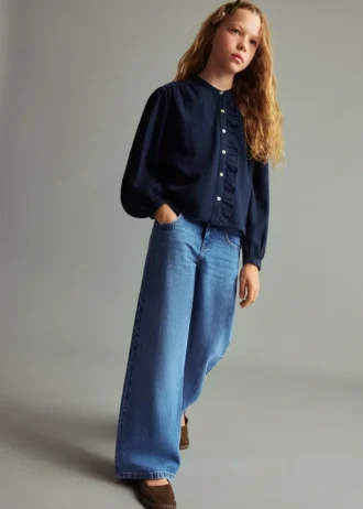 Jean à jambes larges avec clous Jean à jambes larges avec clous