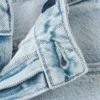 Jean à jambes larges avec poches en forme de cœur