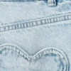 Jean à jambes larges avec poches en forme de cœur