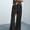 Jean à jambes larges et plissé Jean à jambes larges et plissé