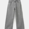 Jean à jambes larges et strass Jean à jambes larges et strass