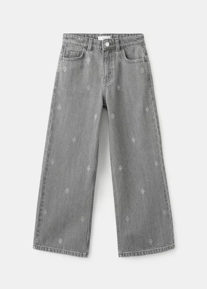Jean à jambes larges et strass Jean à jambes larges et strass