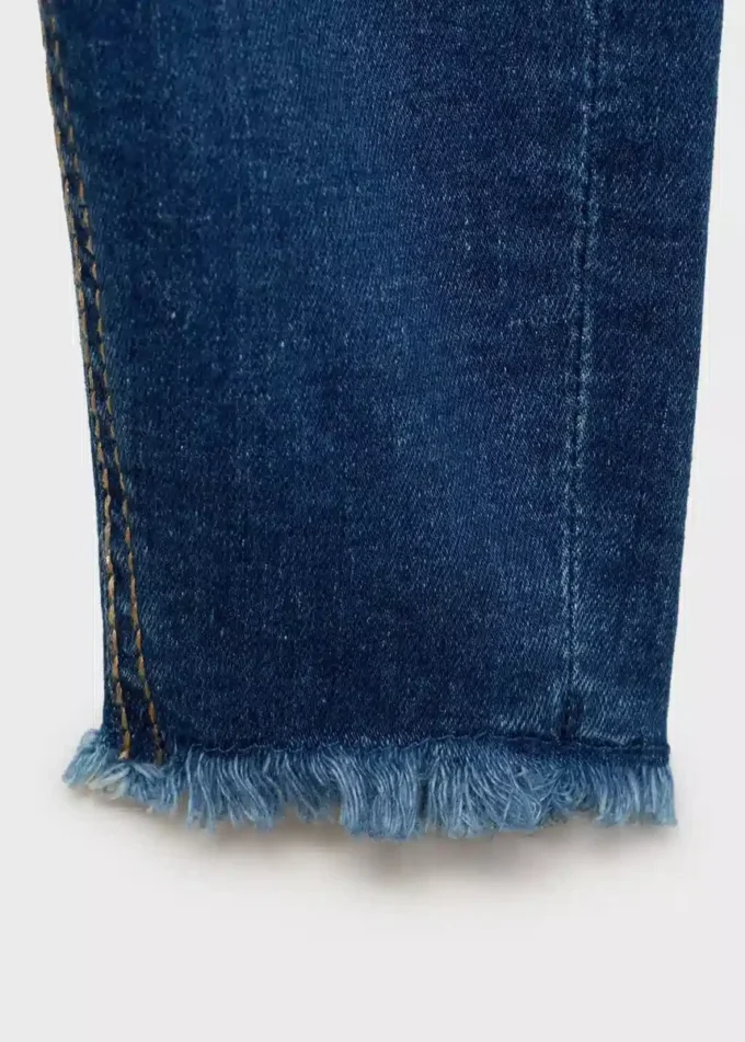 Jean skinny à ourlet effiloché Jean skinny à ourlet effiloché