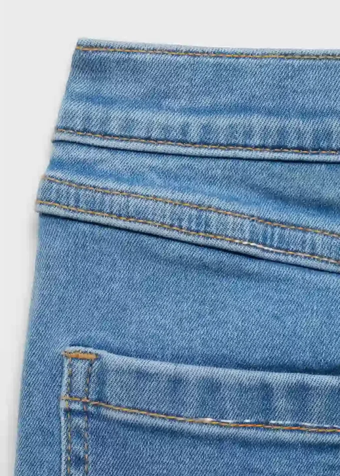 Jean skinny taille basse effiloché