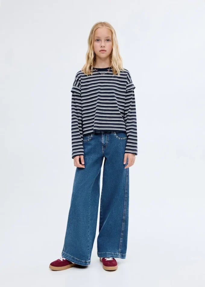 Jean taille basse à clous