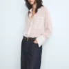 Jean taille mi-haute à jambes larges Jean taille mi-haute à jambes larges