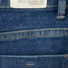 Jeans évasés à boutons Jeans évasés à boutons