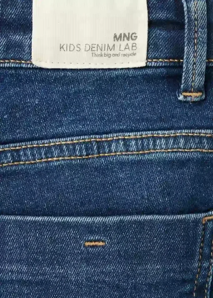 Jeans évasés à boutons Jeans évasés à boutons