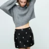 Jupe en simili cuir cloutée Jupe en simili cuir cloutée