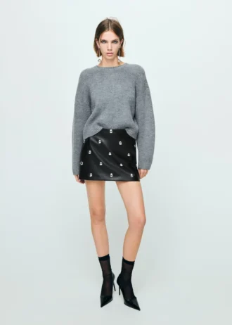 Jupe en simili cuir cloutée