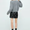 Jupe en simili cuir cloutée Jupe en simili cuir cloutée