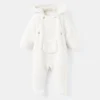 Long manteau en peau lainée