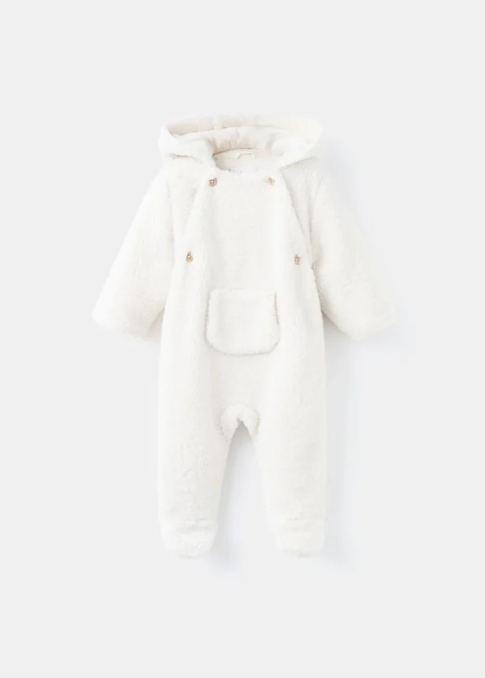 Long manteau en peau lainée