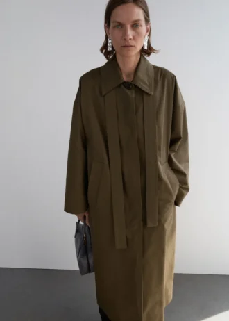 Long trench-coat en coton avec boutons dissimulés