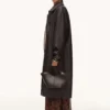 Long trench-coat en simili cuir