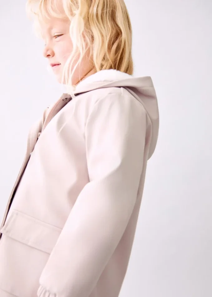 Manteau caoutchouté avec doublure effet fourrure