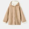 Manteau à capuche effet peau de mouton