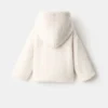 Manteau à capuche effet peau de mouton