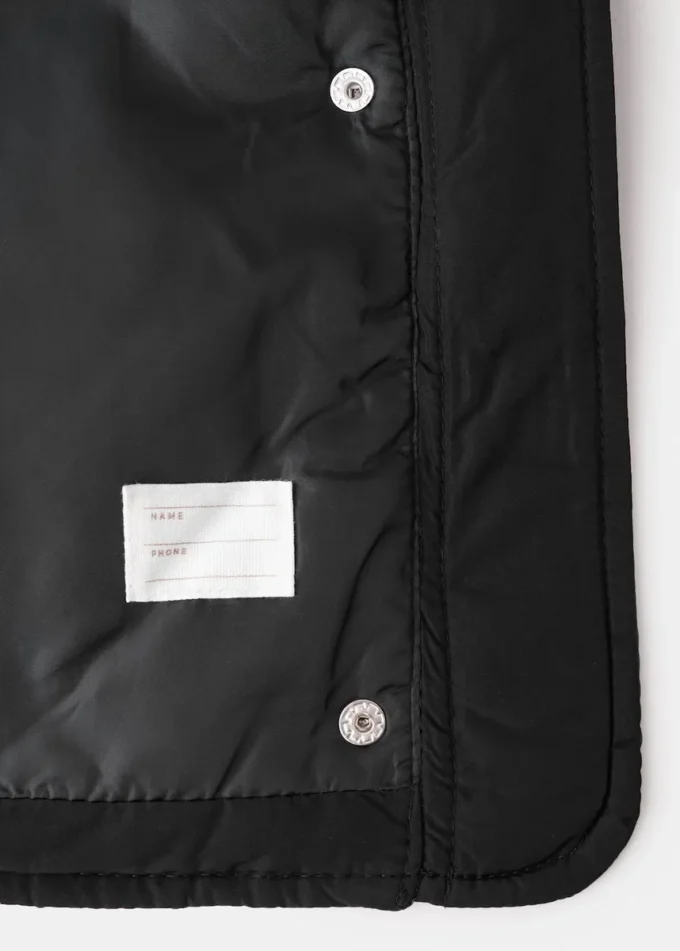 Manteau à capuche en plumes