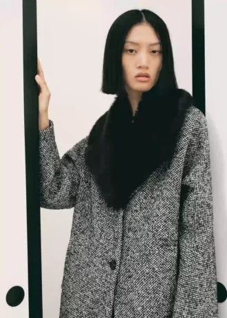 Manteau chiné avec col en fourrure