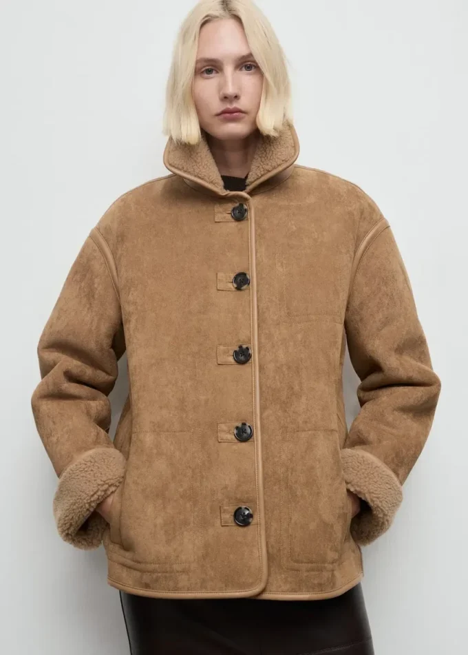 Manteau effet cuir en fausse peau lainée