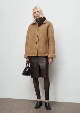Manteau effet cuir en fausse peau lainée