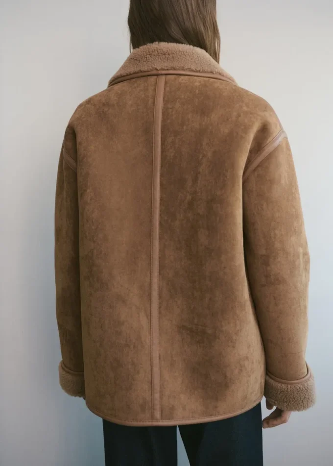 Manteau effet cuir en fausse peau lainée
