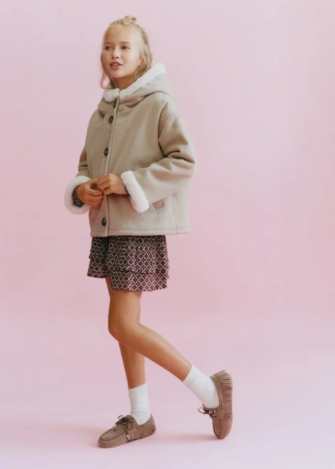 Manteau effet fourrure et daim