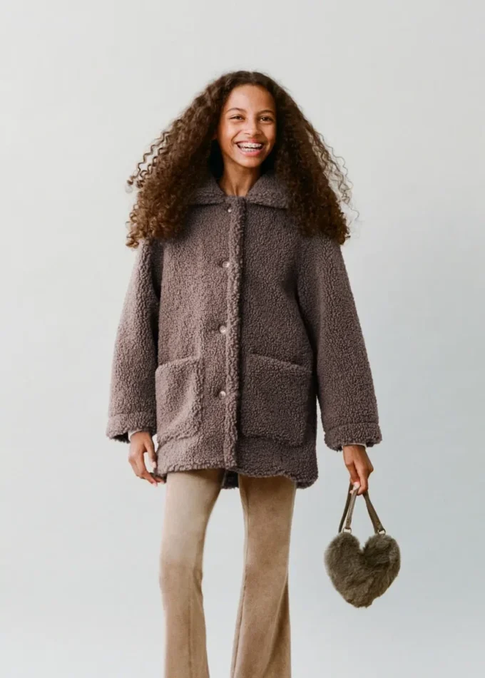 Manteau effet peau lainée