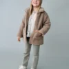 Manteau effet peau lainée