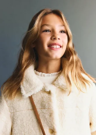 Manteau effet peau lainée