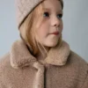 Manteau effet peau lainée